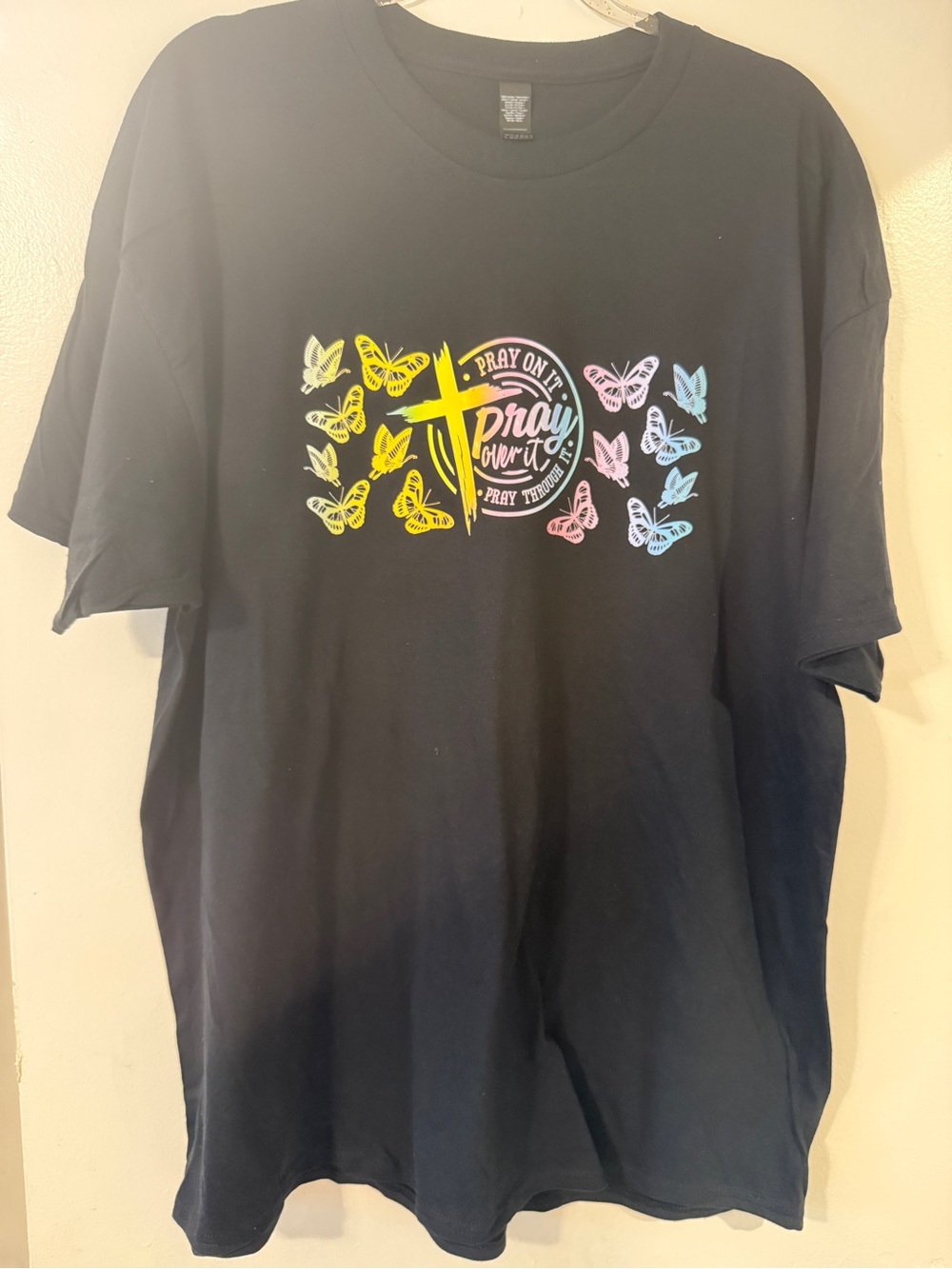 H&M Black Short Sleeve Tee with Pastel Butterfly Cross Graphic